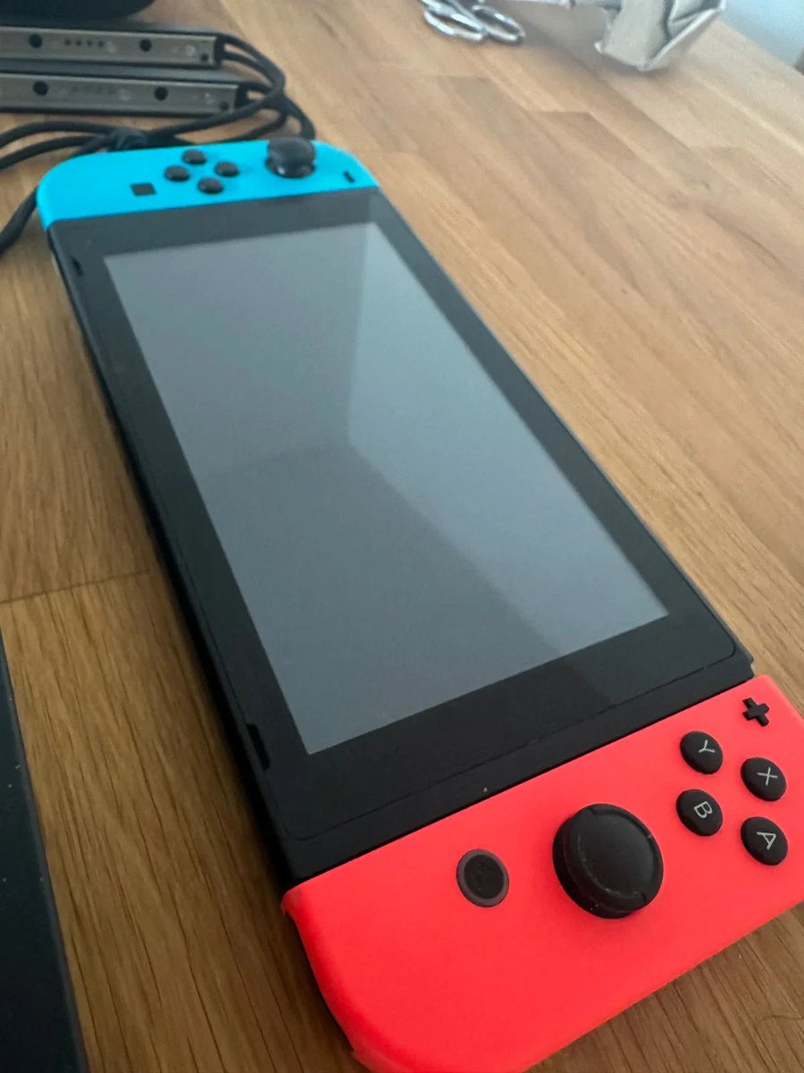 [Pack] Nintendo Switch 2017 + 2 jeux + carte mémoire 128 Go