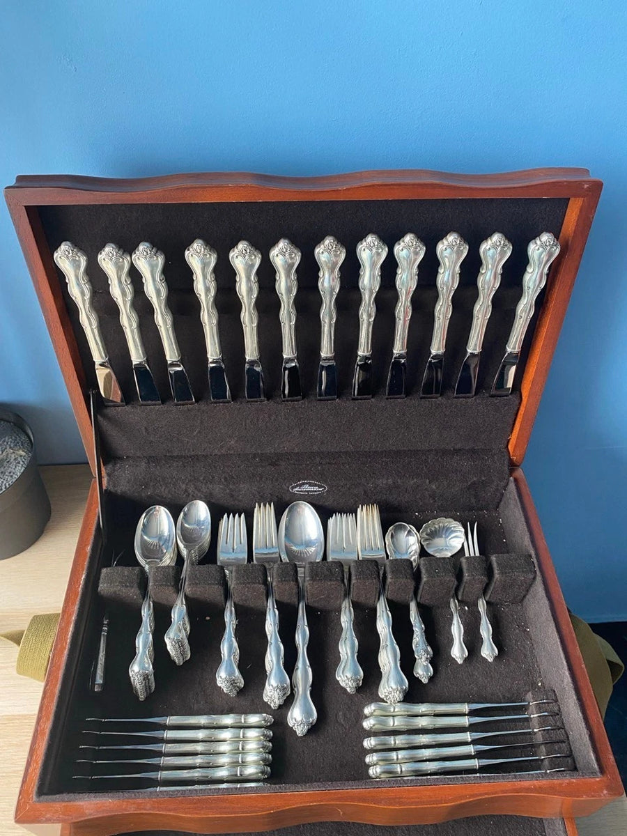 Service de couverts en argent massif International Silver